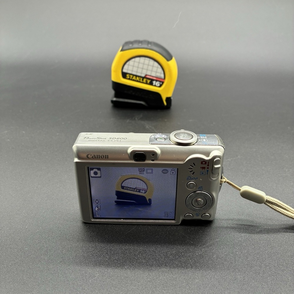 Canon PowerShot SD600 Digital ELPH 6MP Silver Camera Tested w/ Battery Case - Picture 7 of 8
